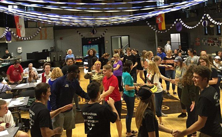 Students dance to the "Fliegerlied" at the BW Oktoberfest.